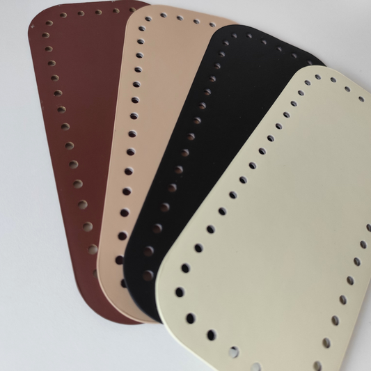 Basi rettangolari per borse in pelle vegana nei colori marrone, beige, nero e panna