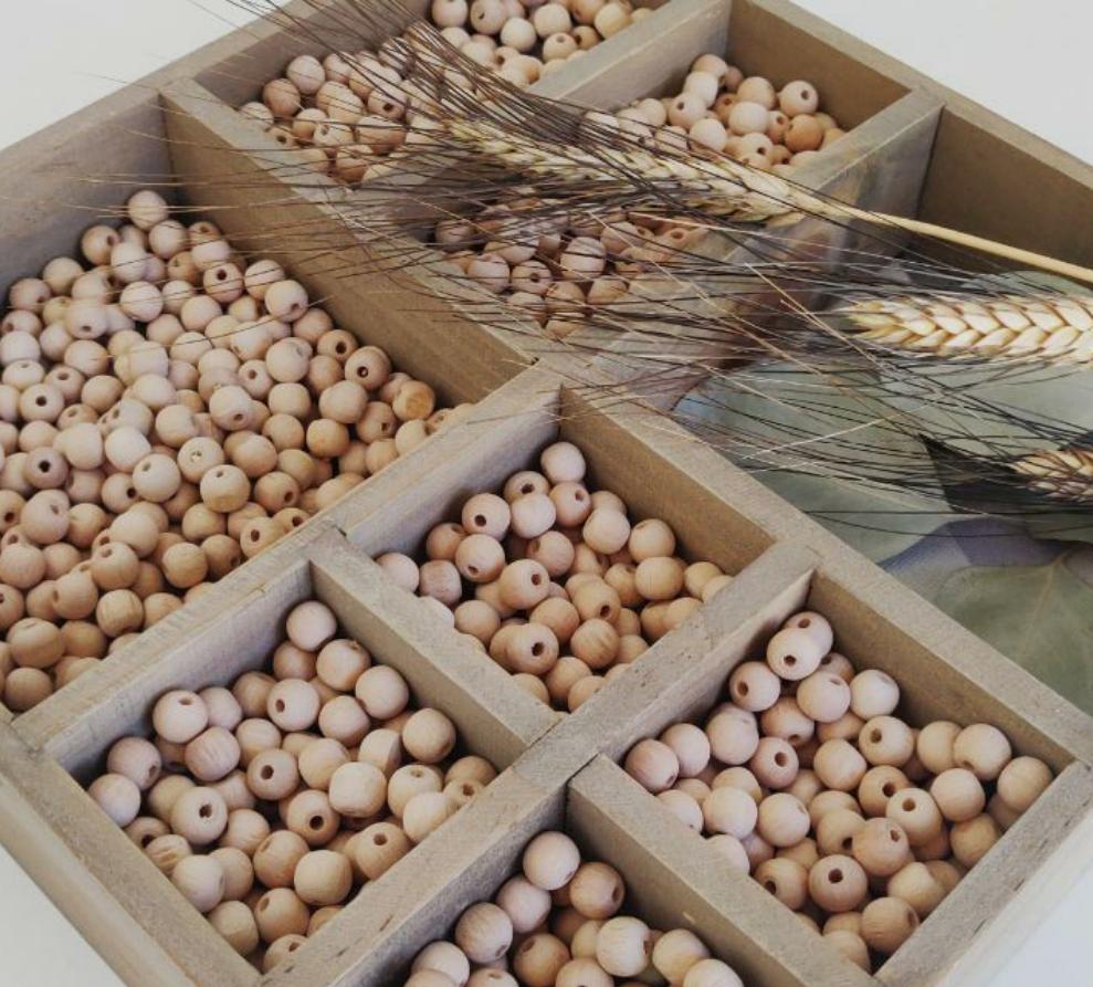 Perline di legno con fori piccoli