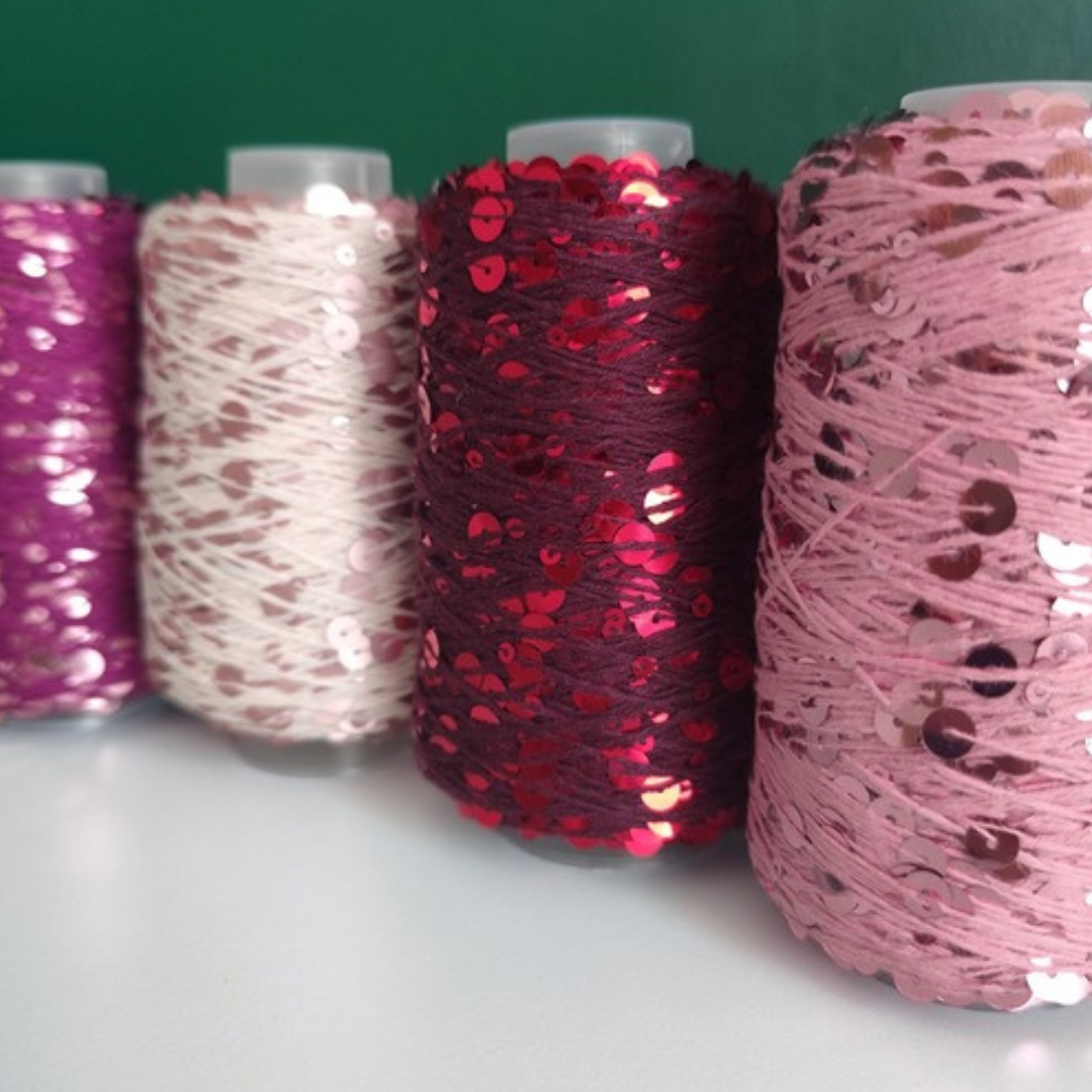 Filato Disco Diva con paillettes nei colori fuchsia, rosa, bordeaux e fragola di Macrame Spaghetti